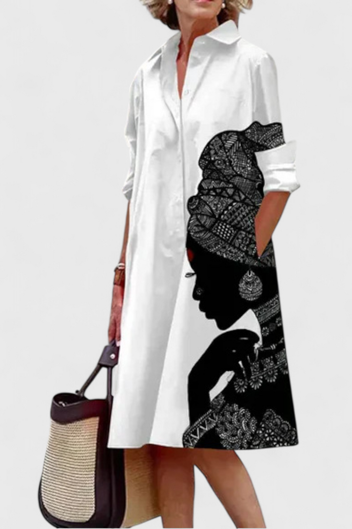 Larissa Vestido Blanco con Silueta Africana en Contraste